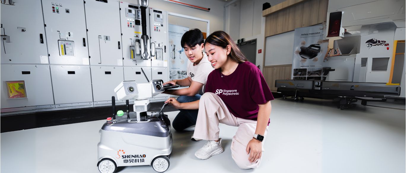 Students with a robot