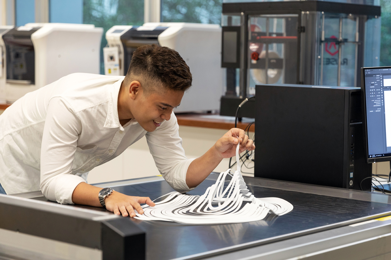 Student Using plotting machine