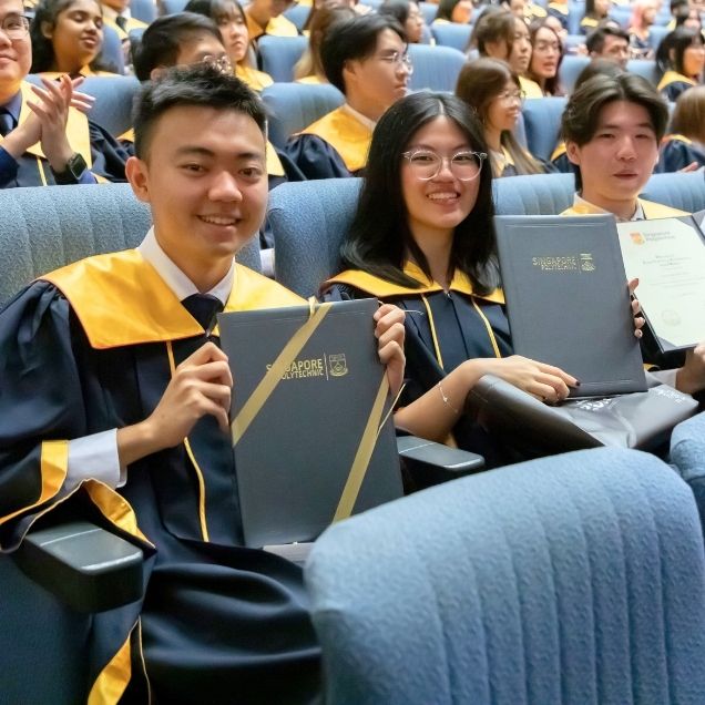SP Graduates Holding Their Certificate