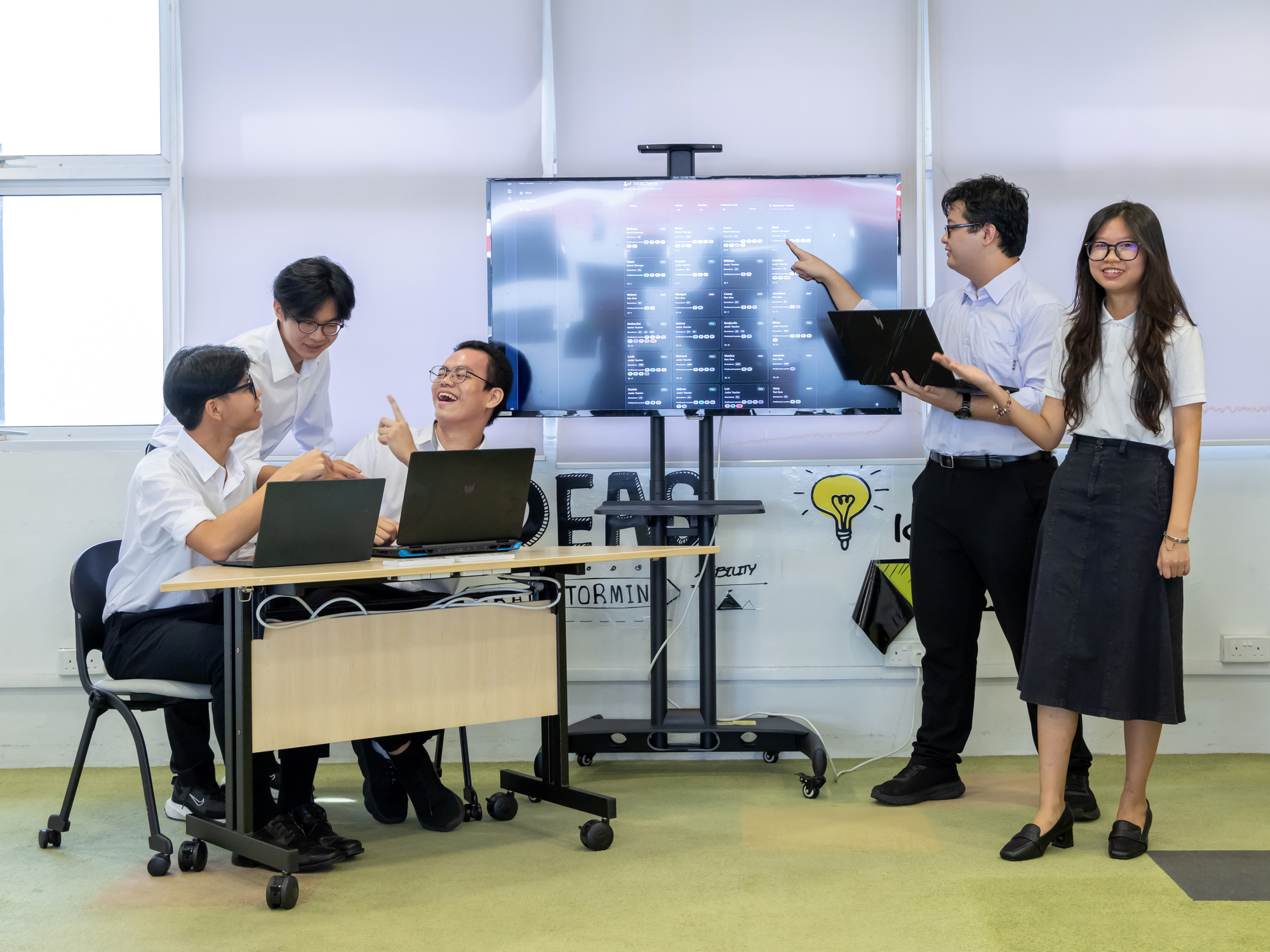 Students exhibiting the virtual environment and rehab activities.